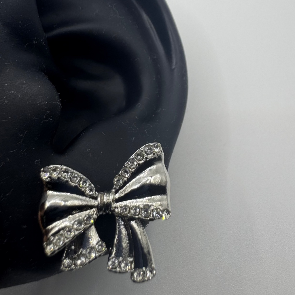 SilverGlow Bow Earrings